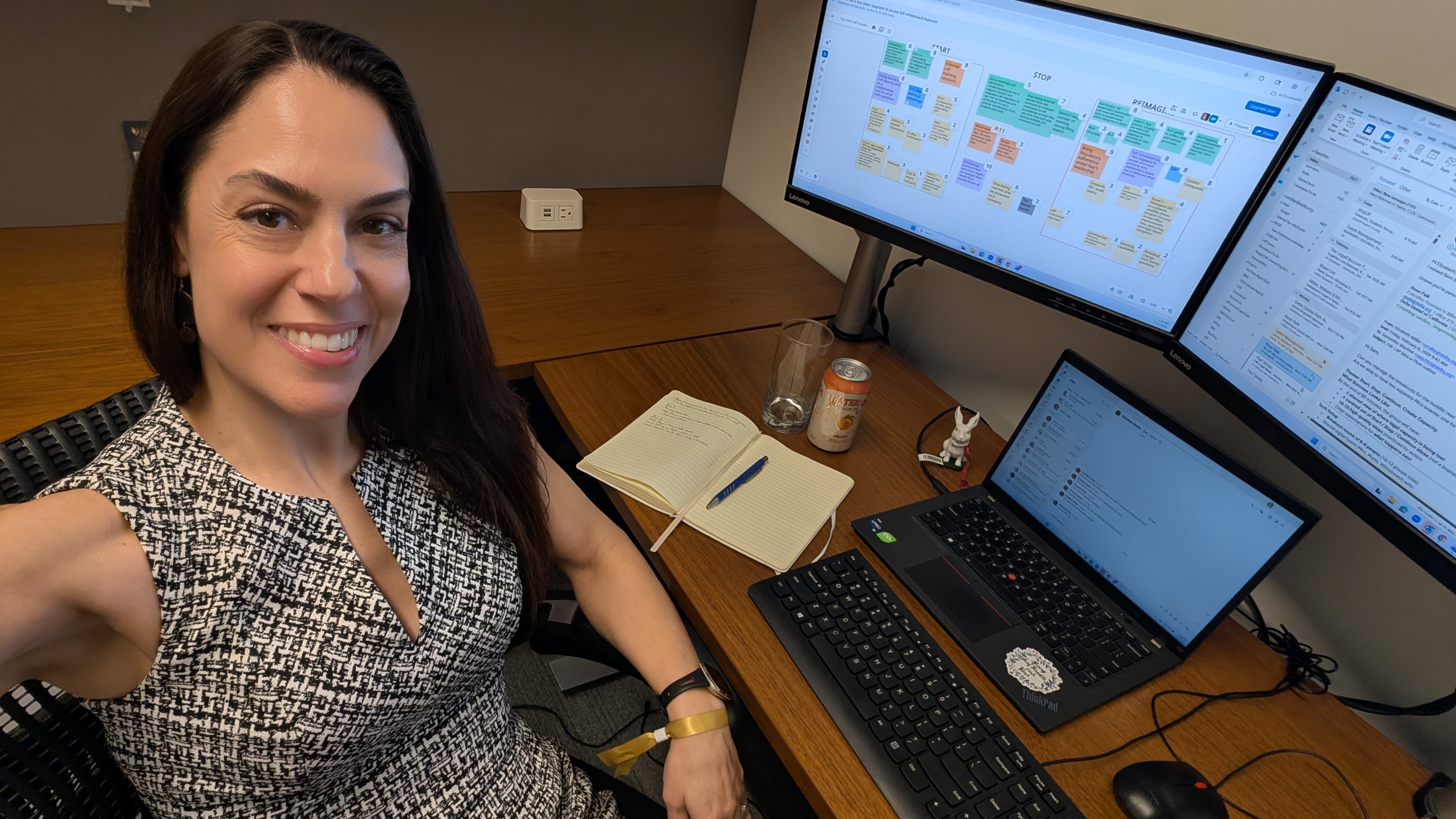 Elizabeth Miller at her desk